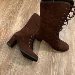 Suede laces up boot with 2 inch heel.